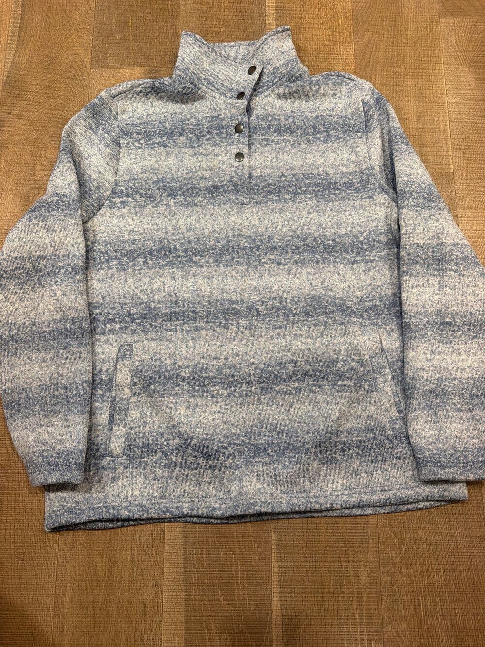 cozy blue and white heathered fleece pullover features a mock neck